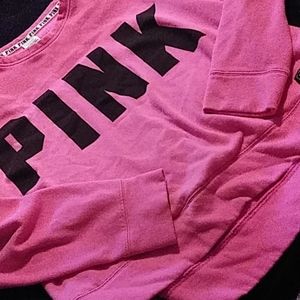 Pink sweater logo
